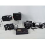 Photography - A quantity of cameras to include a Yashica EZ-Matic, a Pacer 35EC,