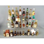 30 miniature bottles of whisky, gin,