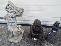 Three reconstituted stone garden ornaments.