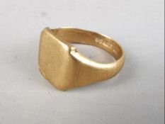 A gentleman's hallmarked 9ct yellow gold ring, size U (shank slightly misshapen), approximately 7.