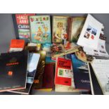 A mixed lot to include vintage books, Cunard cruise liner ephemera, stamp collecting books,