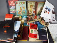 A mixed lot to include vintage books, Cunard cruise liner ephemera, stamp collecting books,