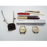 A small mixed lot of collectables to include pens, Victorinox knife,