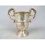 A George V twin handled, hallmarked silver trophy,