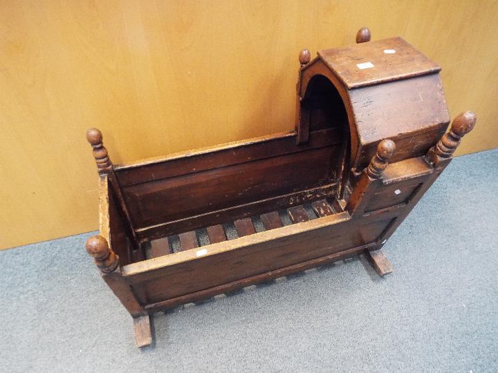 A late Georgian / early Victorian child's rocking crib with hinged hood and turned finials - Image 3 of 3