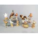 Ten bird figurines of varying size to include Kowa Porcelain and others, comprising Tree Sparrow,