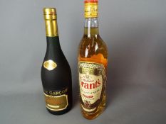 Two bottles of spirits comprising Grant's Family Reserve 70 cl 40% ABV and Veux Garcon Cognac 70 cl