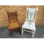 Two hall chairs, one painted with upholstered seat and back and one with cane panel seat.