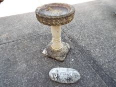 Lot Withdrawn - A reconstituted stone bird bath measuring approximately 65 cm (h) x 41.