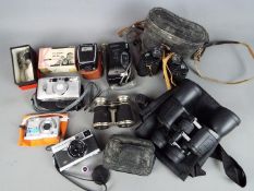 Photography - A collection of cameras and binoculars to include Fujifilm, Olympus 35 ECR,