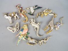 A collection of stone set costume jewellery brooches in the form of animals.