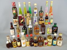 30 miniature bottles of whisky, gin,