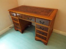 A good clean leather topped pedestal desk,