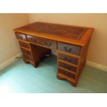 A good clean leather topped pedestal desk,