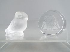 A Lalique frosted glass owl, signed to the base, approximately 5.