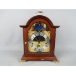 A Franz Hermle moon phase mantel clock.