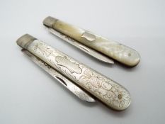 Two George V silver and mother of pearl folding fruit knives,