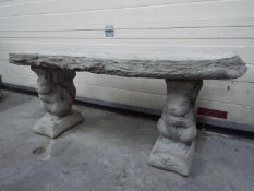 Garden Stoneware - A reconstituted stone garden bench with a timber effect seat and plinths in the