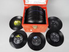 A collection of 7" vinyl records to include The Beatles, Paul McCartney & Wings and other.