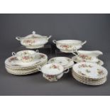 Royal Albert - a dinner service decorated in the Moon Rose pattern