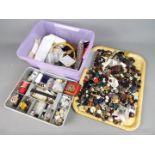 A box of sewing accessories and a large quantity of buttons.