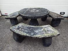 Reconstituted stone garden furniture comprising table and three benches, dismantles for transport.
