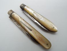 Two silver and mother of pearl folding fruit knives, the first a Victorian example,