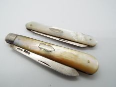 Two George V silver and mother of pearl folding fruit knives,