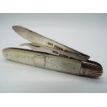 An Edward VII silver and mother of pearl folding fruit knife and pick,