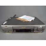 A JVC Hi Fi VHS Video Cassette Player / Recorder, model HR-J665 B.E.S.T Picture System.
