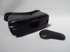A Samsung Gear VR headset and controller