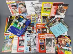 Football - a good collection in excess of 50 matchday programmes with many interesting examples to