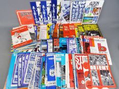 Football Programmes. A shoe box full of unsorted programmes from the early 1970s, approx.