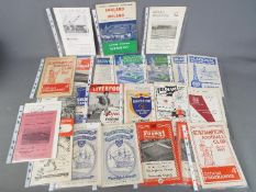 Football Programmes. A folder containing forty programmes from the mid-1950s to the mid-1960s.