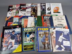 A collection of sporting programmes,