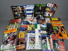 Rugby Union - a carton containing a large collection of 1970s and later matchday programmes,