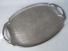 An Art Nouveau pewter tray by Hutton of Sheffield, stamped to the base '1105', possibly for Liberty,