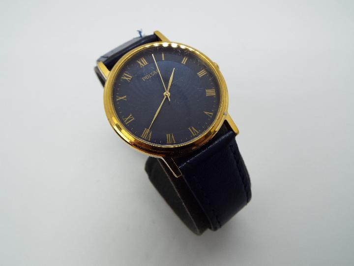 A gentleman's Pulsar wristwatch, Roman numerals to a blue dial, on blue leather strap, boxed. - Image 3 of 3
