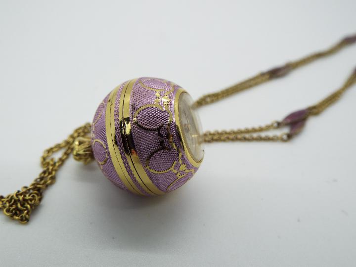 A Rex pendant globe watch, lilac toned body with gilt metal detailing, 17 jewel Swiss movement, - Image 3 of 3