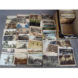 In excess of 500 mainly early period UK and foreign topographical postcards to include real photos