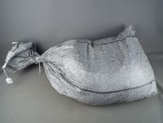 Costume Jewellery - A sealed sack containing approximately 27.5 Kg of unsorted costume jewellery.
