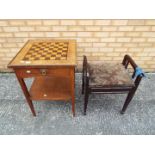 A chessboard table measuring approximately 72 cm x 51 cm x 51 cm and a piano stool.