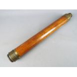 A brass and wood single draw telescope, marked 'Dollond London' to the barrel,