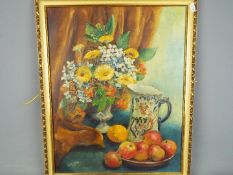 A framed still life oil on board, titled verso 'Autumn Flowers & Fruit With Old Jug',