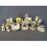 Seven Coalport floral cottage and a small quantity of Royal Albert Old Country Roses.