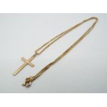 A hallmarked 9ct yellow gold necklace, 50 cm (l), with crucifix pendant stamped 9ct,