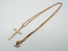 A hallmarked 9ct yellow gold necklace, 50 cm (l), with crucifix pendant stamped 9ct,