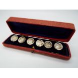 A set of six Edward VII hallmarked silver buttons, each depicting a lady in profile,