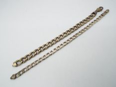 Two silver curb chain bracelets (both A/F), stamped 925, approximately 59 grams all in.