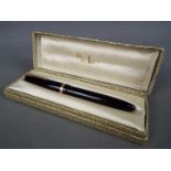 A vintage Parker Maxima Duofold fountain pen in black, with nib stamped 14k,